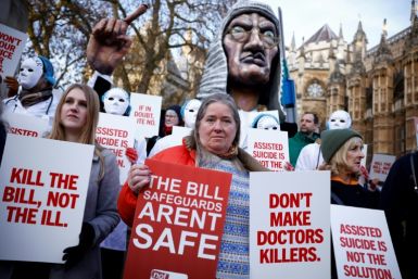 Campaigners against the assisted suicide bill demonstrate outside parliament