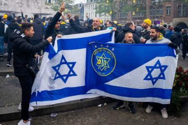Five Maccabi fans were briefly hospitalised after being beaten up following a match with Ajax Amsterdam