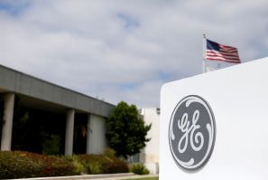 The logo of Dow Jones Industrial Average stock market index listed company General Electric