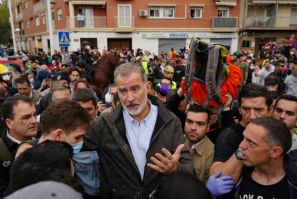 The mud-spattered royal couple braved the popular anger to speak with victims in Paiporta on November 3