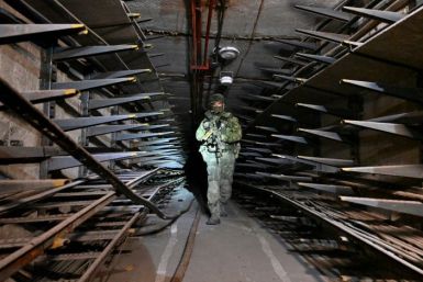 Now Russian soldiers and their separatist allies with white armbands patrol the ruins of the Soviet-era factory that was once the pride of Mariupol and employed more than 12,000 people