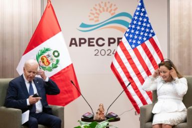 US President Joe Biden, seen here with Peruvian President Dina Boluarte, often took a valedictory tone during 2024's Asia-Pacific Economic Cooperation (APEC) summit in Lima, Peru
