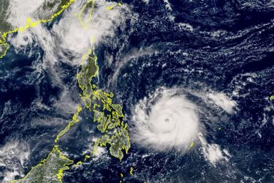 A weakened Typhoon Usagi (top L) is headed for Taiwan even as tropical storm Man-yi (bottom right) develops over the Pacific en route to the Philippines